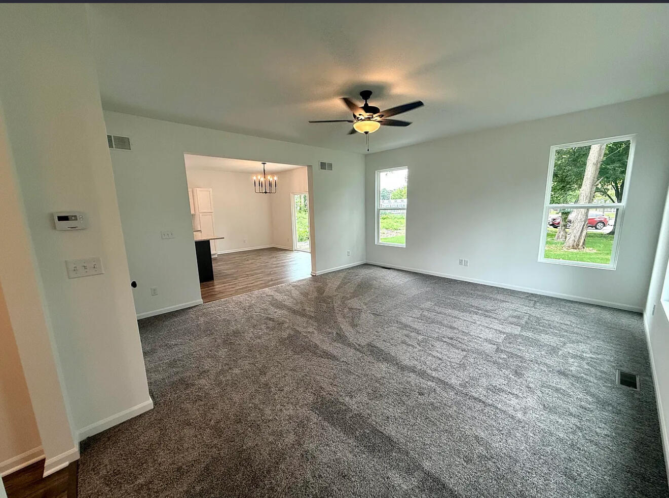 717 Lake Street Hobart, IN 46342 - Photo 6 of 25 a view of an empty room with a window