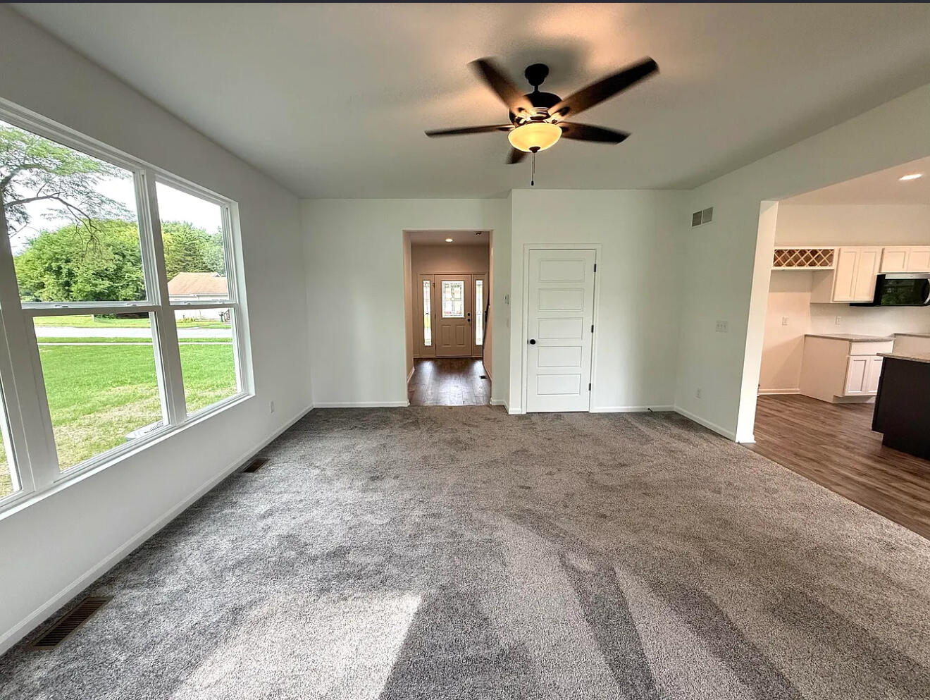 717 Lake Street Hobart, IN 46342 - Photo 7 of 25 a view of an empty room with a window