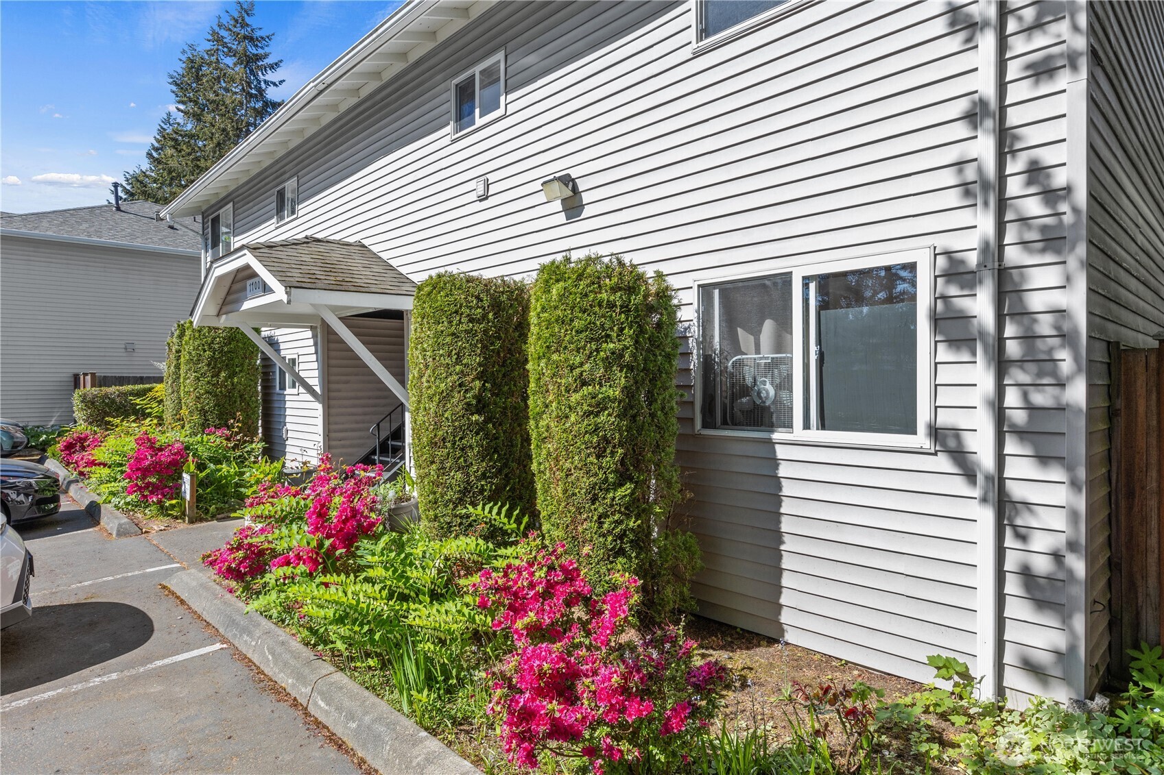 7700 196th Street Southwest, Unit C Edmonds, WA 98036 - Photo 2 of 26 a front view of a house