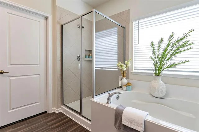 a bath tub sitting next to a white tub