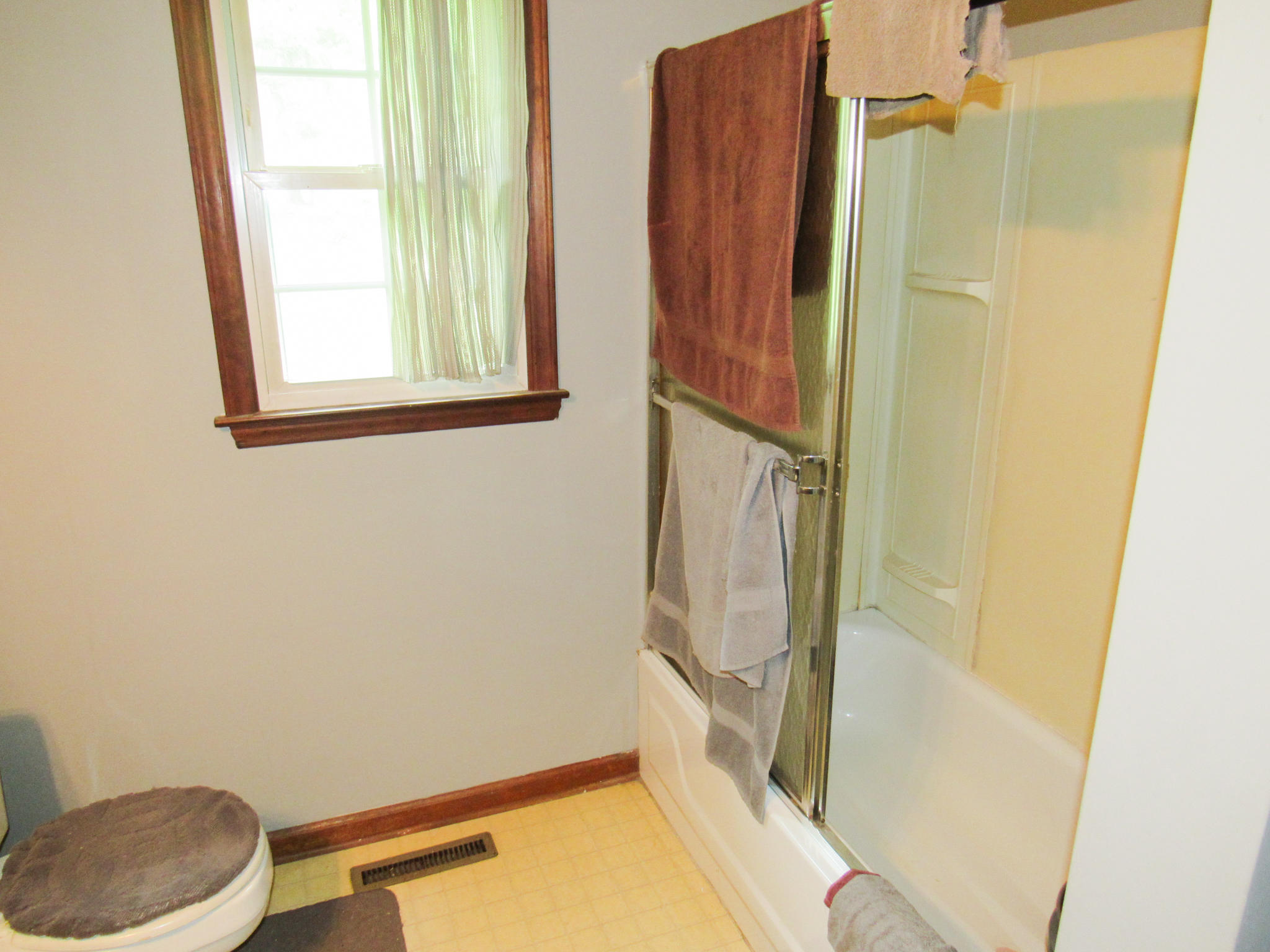 2589 Old Ferrum Road Ferrum, VA 24088 - Photo 15 of 30 a bathroom with a granite countertop sink and a mirror