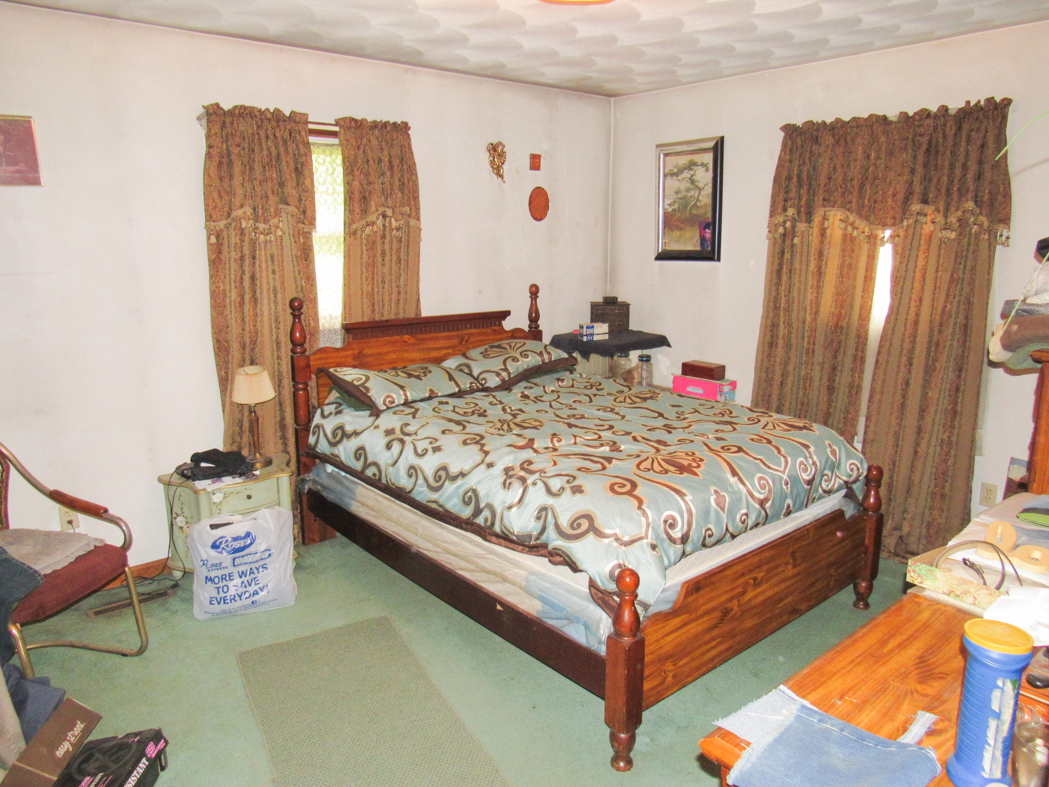 2589 Old Ferrum Road Ferrum, VA 24088 - Photo 16 of 30 a bed sitting in a bedroom next to a window