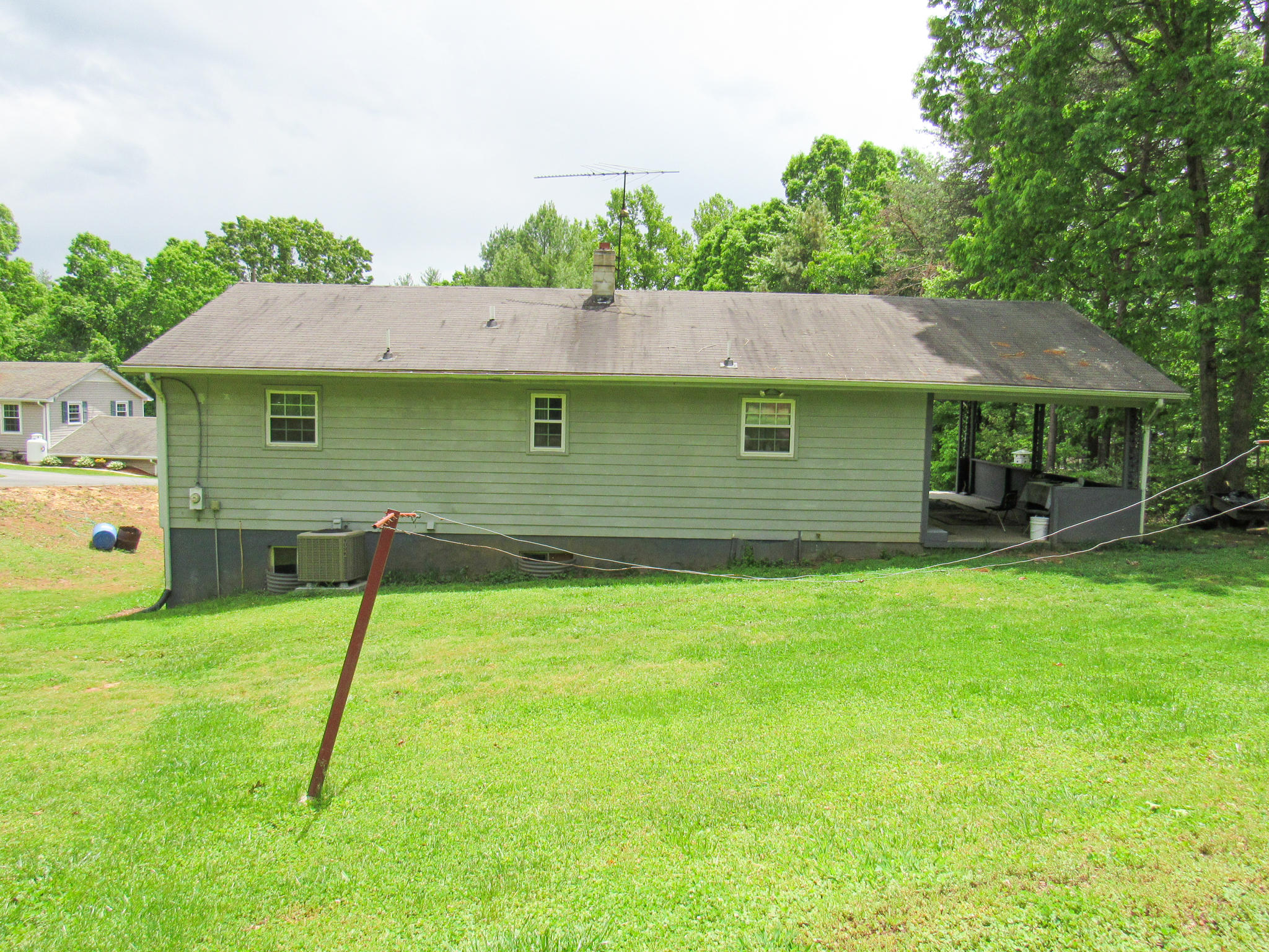 2589 Old Ferrum Road Ferrum, VA 24088 - Photo 7 of 30 a front view of a house with a garden