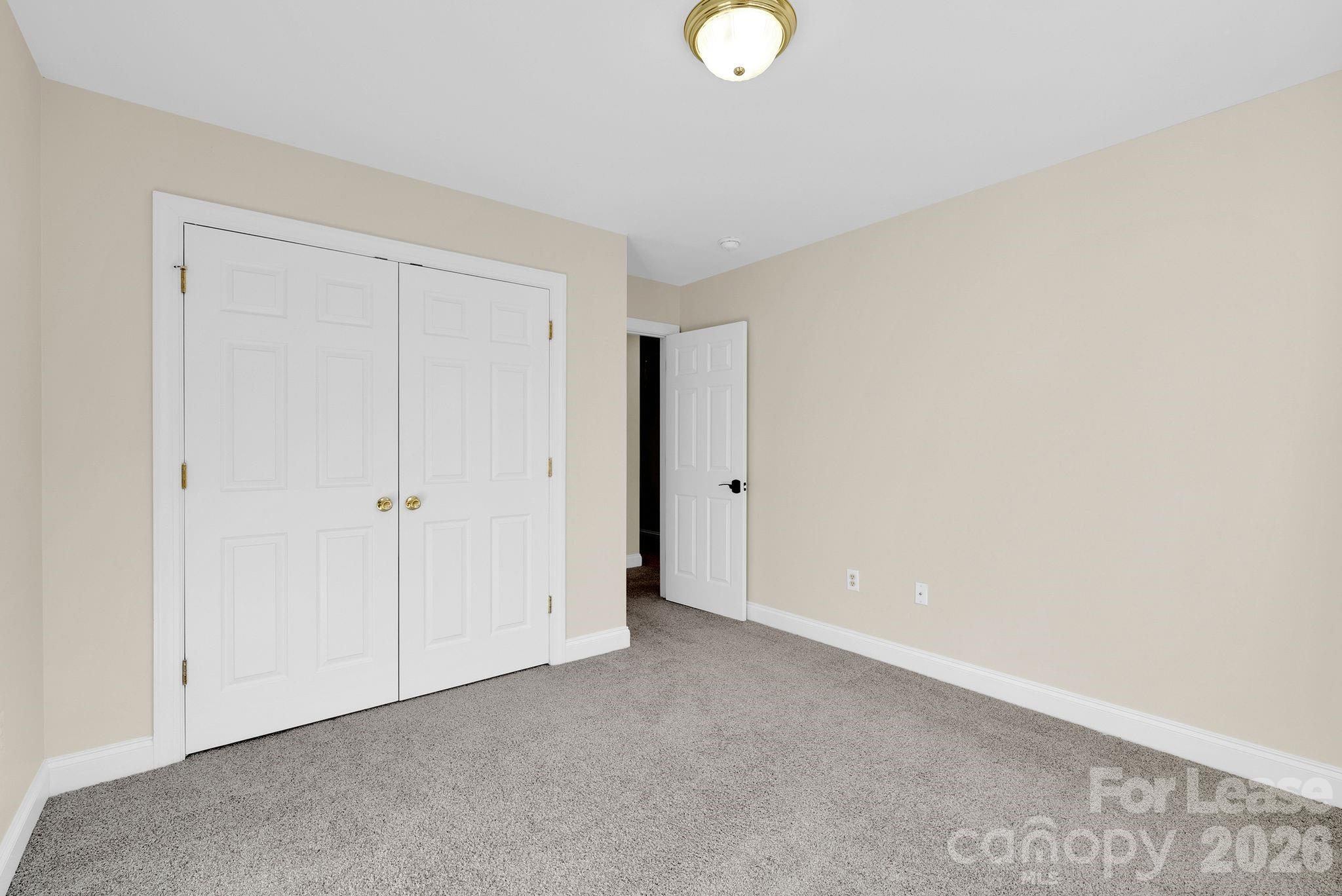 163 Forest Ridge Road Mooresville, NC 28117 - Photo 18 of 48 a view of an empty room
