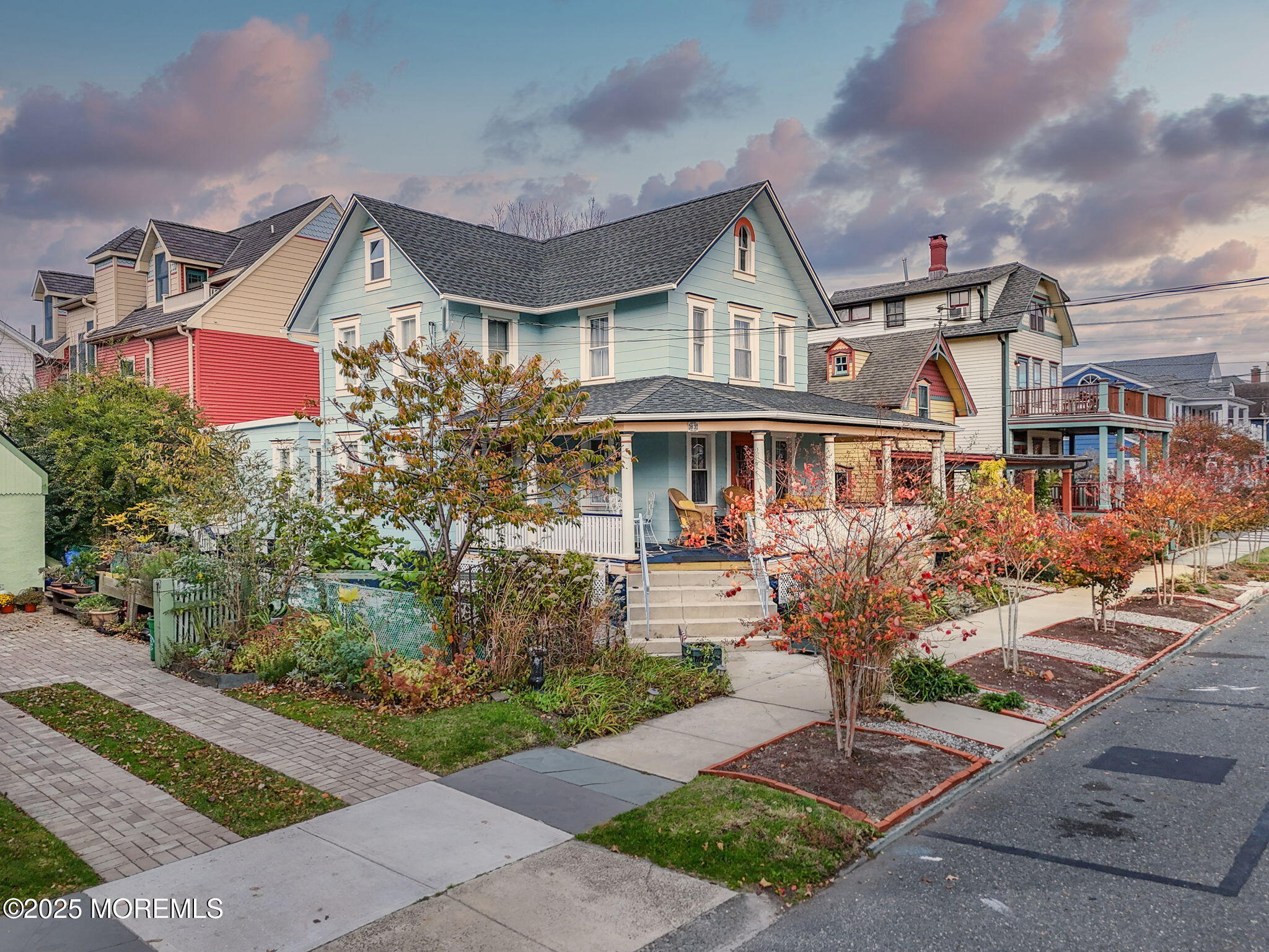 83 Broadway Ocean Grove, NJ 07756 - Photo 2 of 37 a front view of house and yard with green space