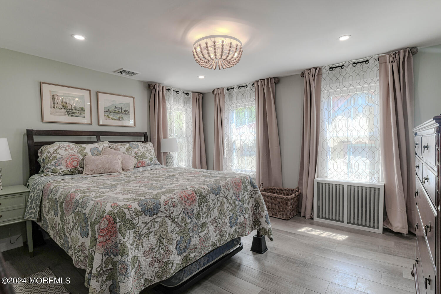 83 Broadway Ocean Grove, NJ 07756 - Photo 32 of 37 a bedroom with a bed and a window