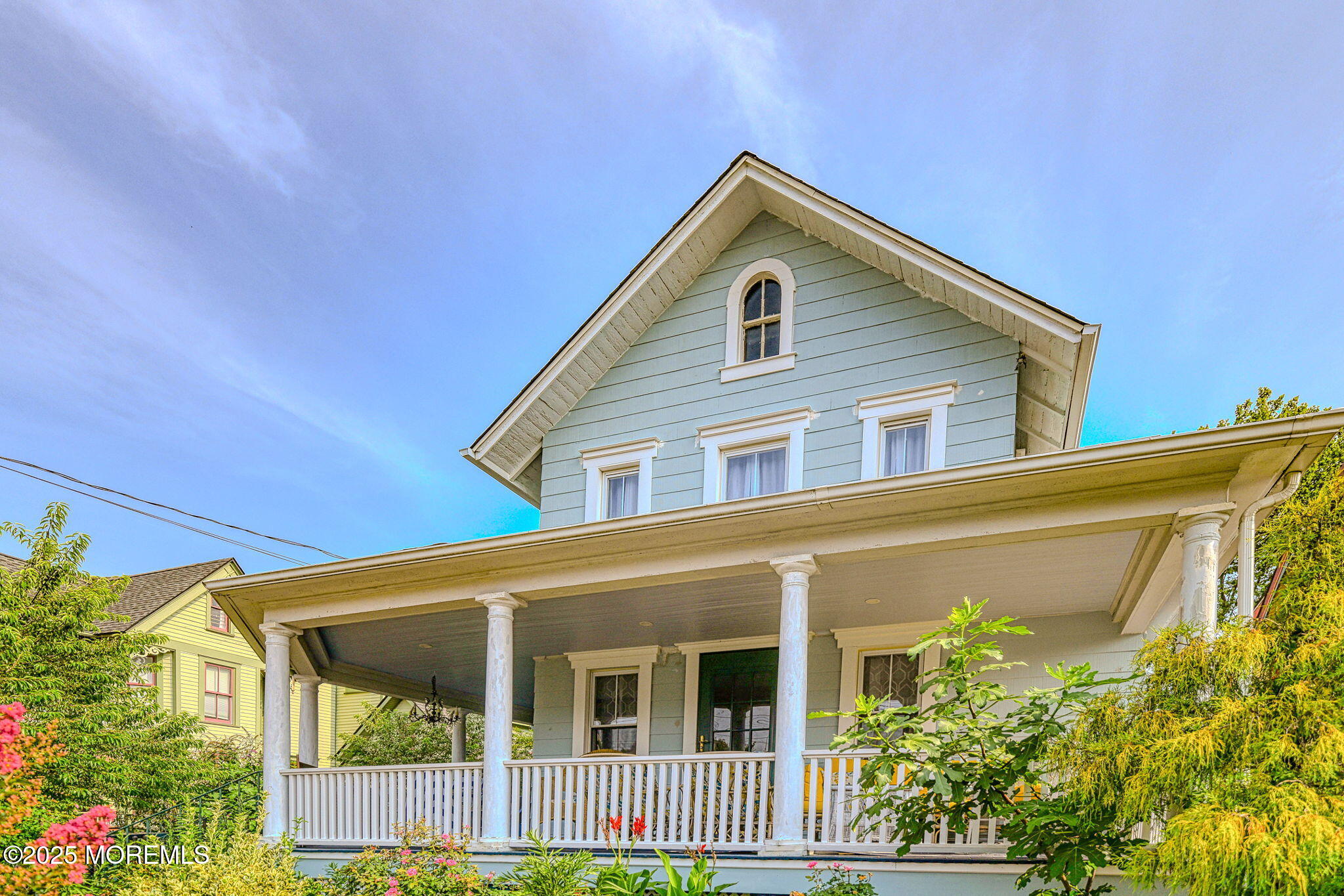83 Broadway Ocean Grove, NJ 07756 - Photo 4 of 37 a front view of a house with a garden