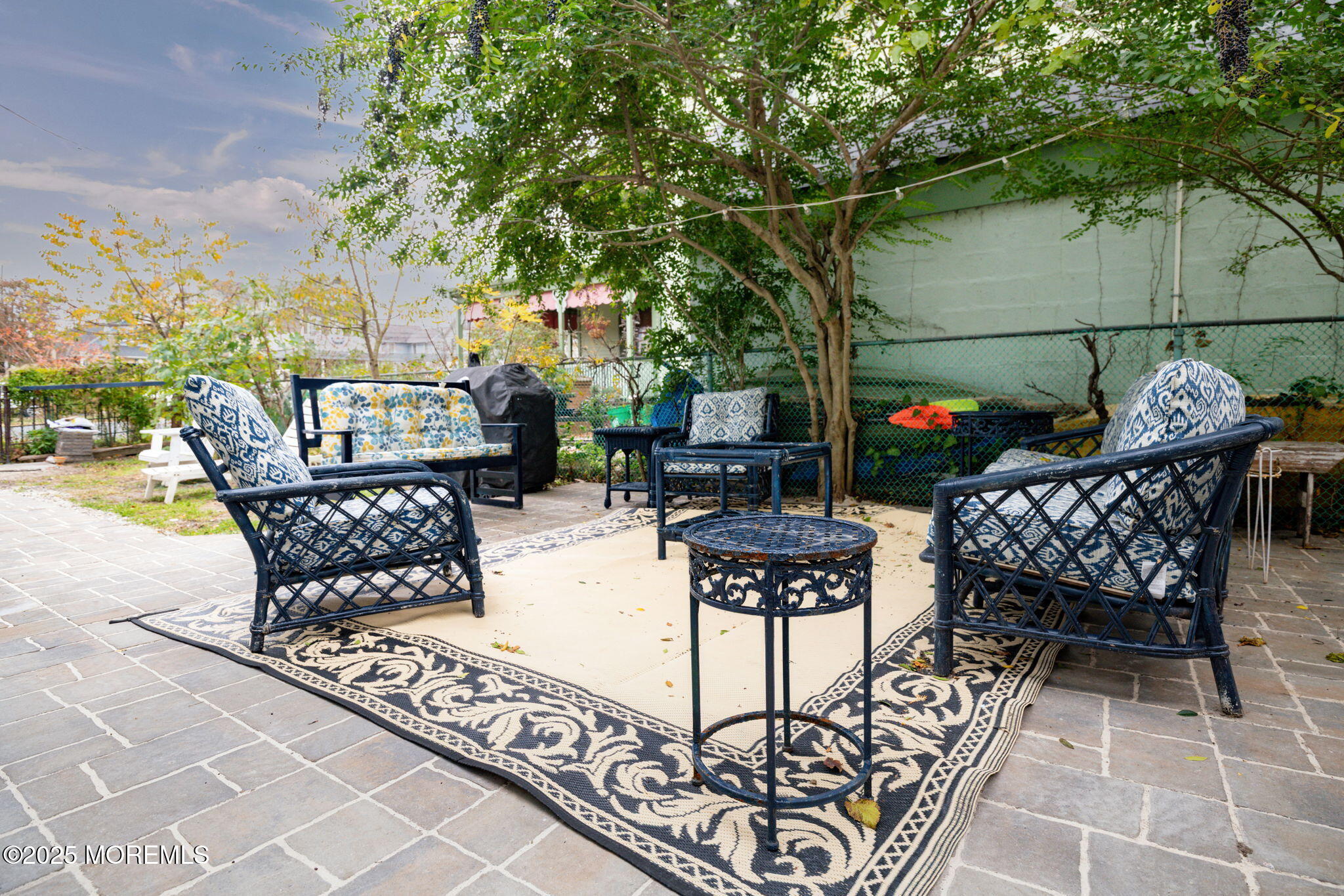83 Broadway Ocean Grove, NJ 07756 - Photo 9 of 37 a view of a chairs and table in patio