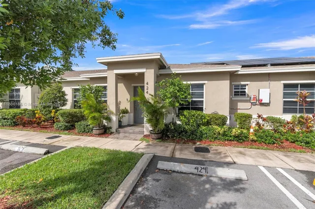 a car parked in front of a house