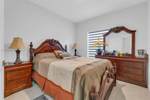 a bedroom with a bed and a closet