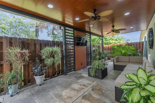 an aerial view of a house with outdoor space