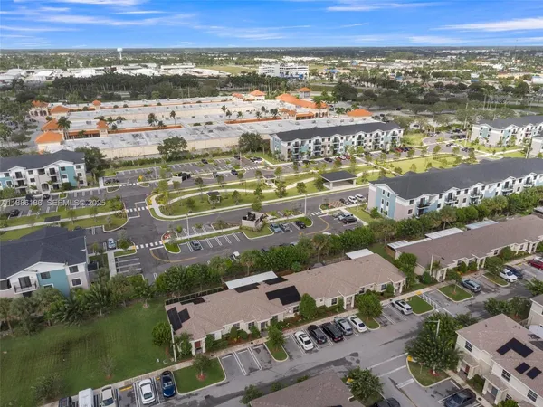 an aerial view of residential building with outdoor space