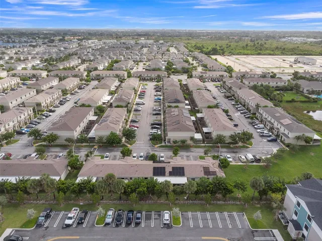 an aerial view of residential building with outdoor space