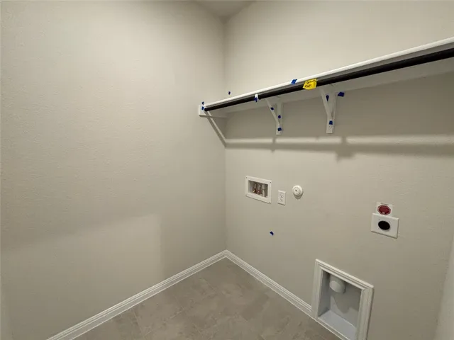 a bathroom with a sink toilet