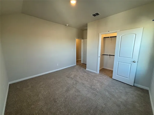 a bathroom with a sink toilet and mirror