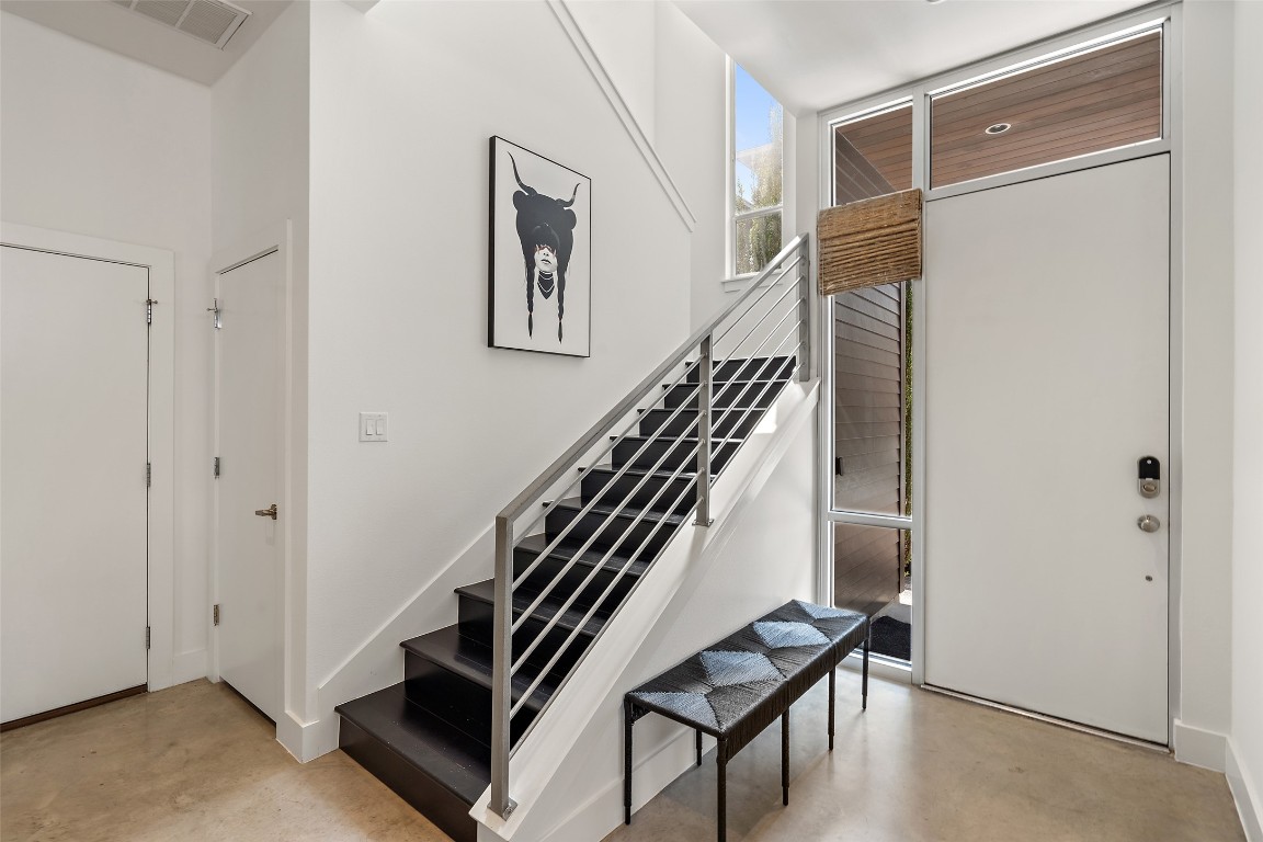 2105 Goodrich Avenue, Unit 2 Austin, TX 78704 - Photo 15 of 40 a view of a hallway with wooden floor and stairs