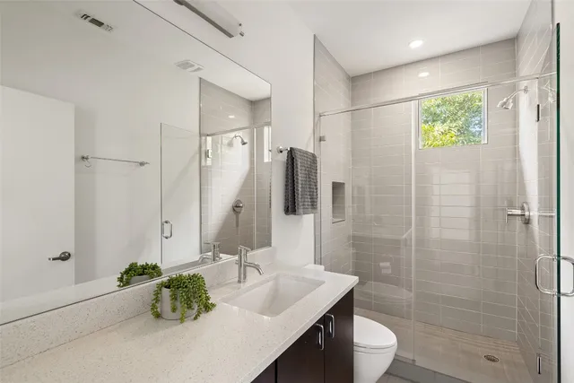 a view of a deck with chairs and wooden floor