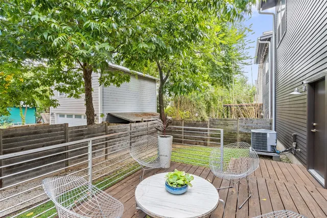 a view of deck with wooden floor and seating space