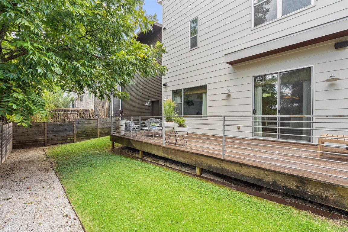 2105 Goodrich Avenue, Unit 2 Austin, TX 78704 - Photo 37 of 40 a view of a house with backyard and sitting area