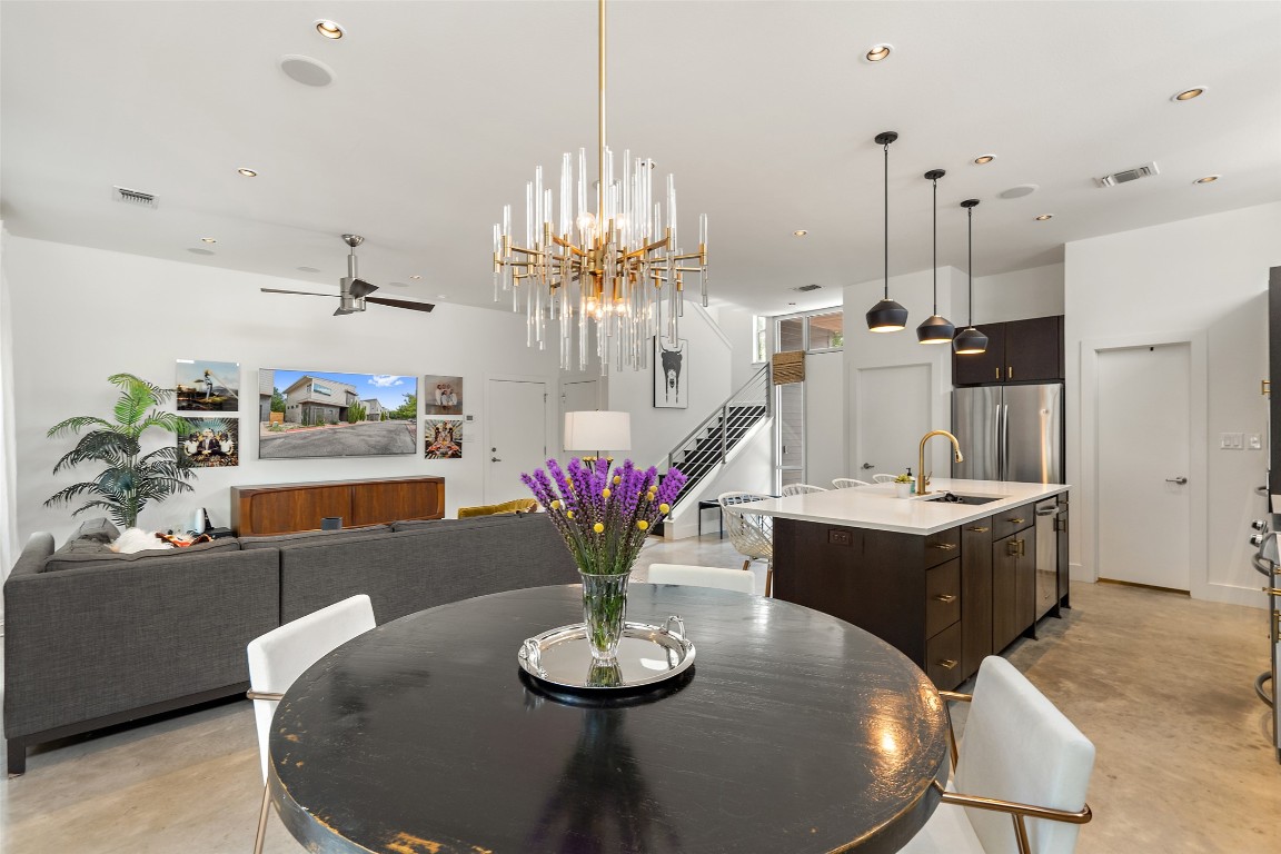 2105 Goodrich Avenue, Unit 2 Austin, TX 78704 - Photo 9 of 40 a dining room with furniture and chandelier