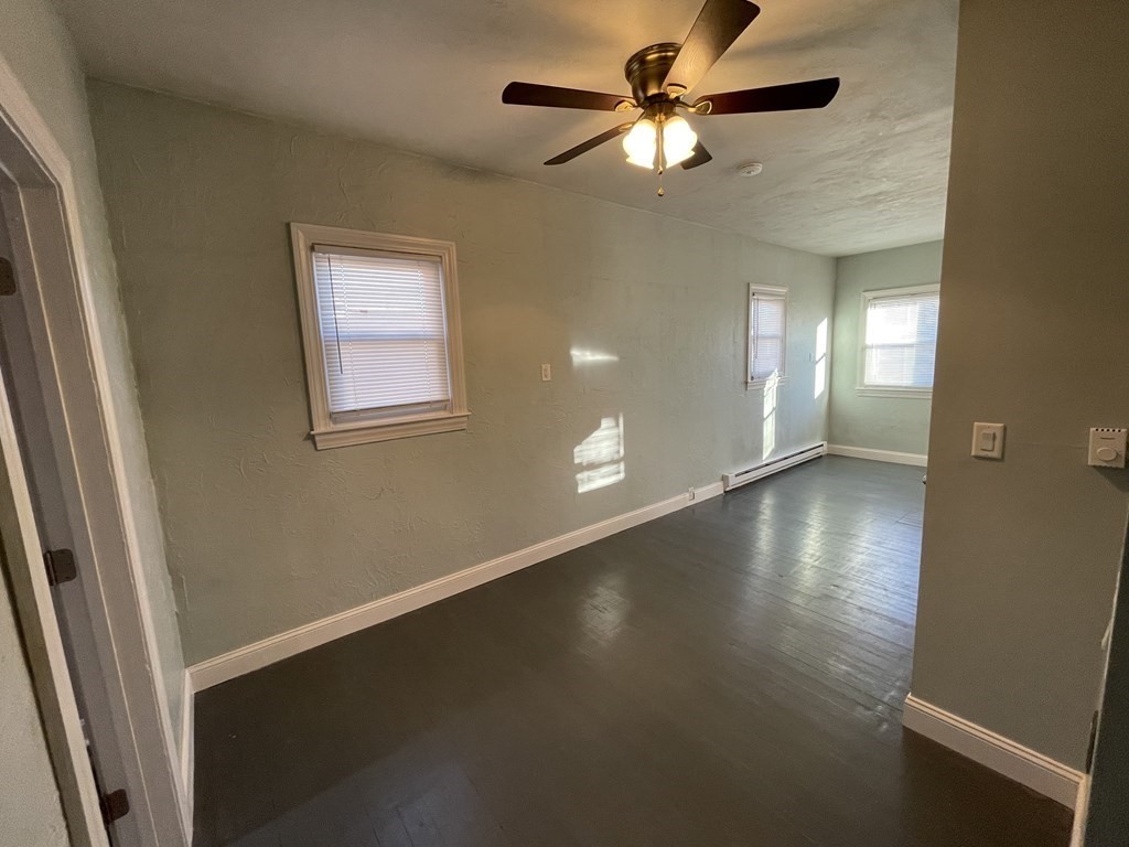 14 Hartford Avenue West, Unit 3 Uxbridge, MA 01569 - Photo 5 of 9 a view of a livingroom with a window