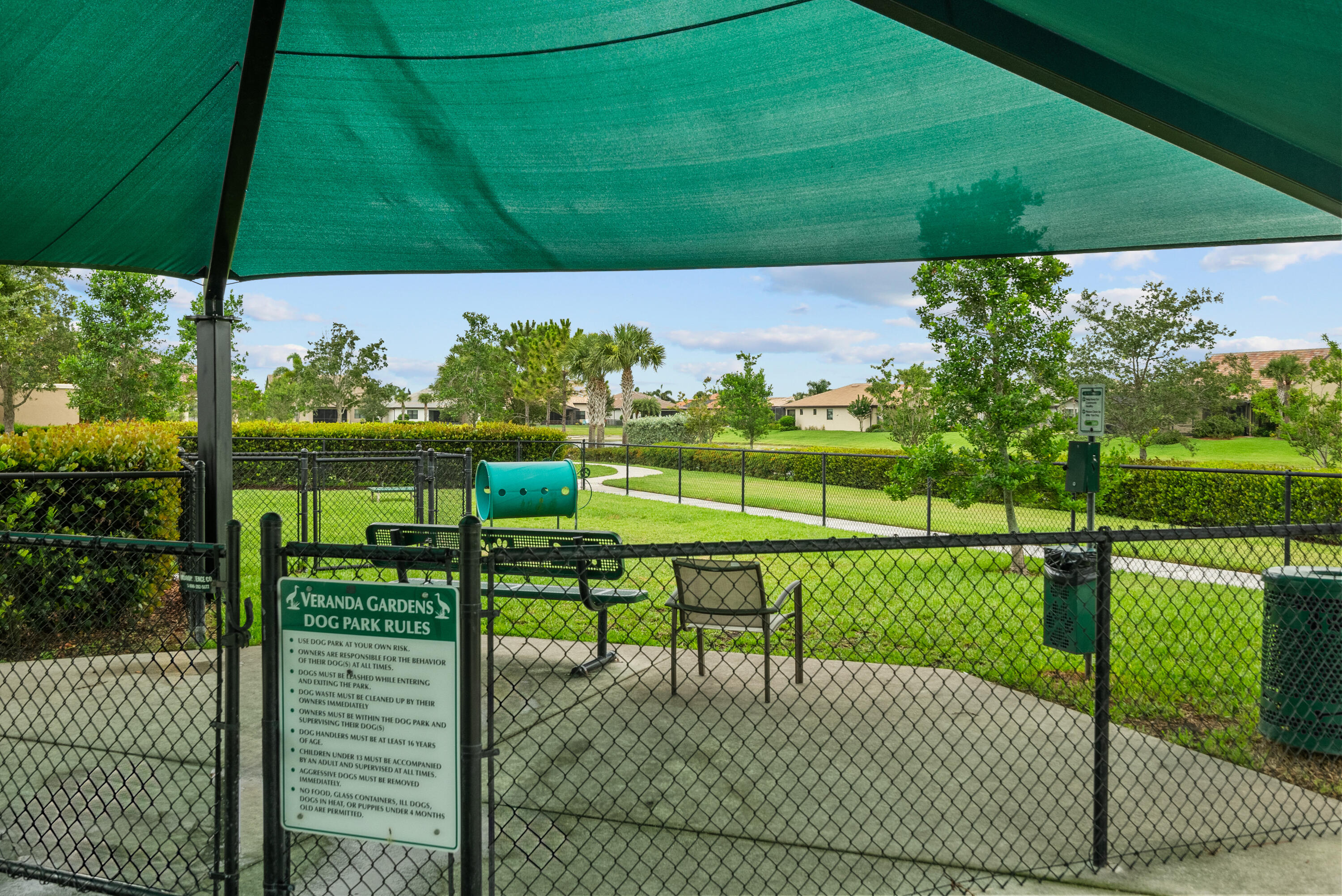 680 Southeast Villandry Way Port St. Lucie, FL 34984 - Photo 33 of 38 a view of a back yard