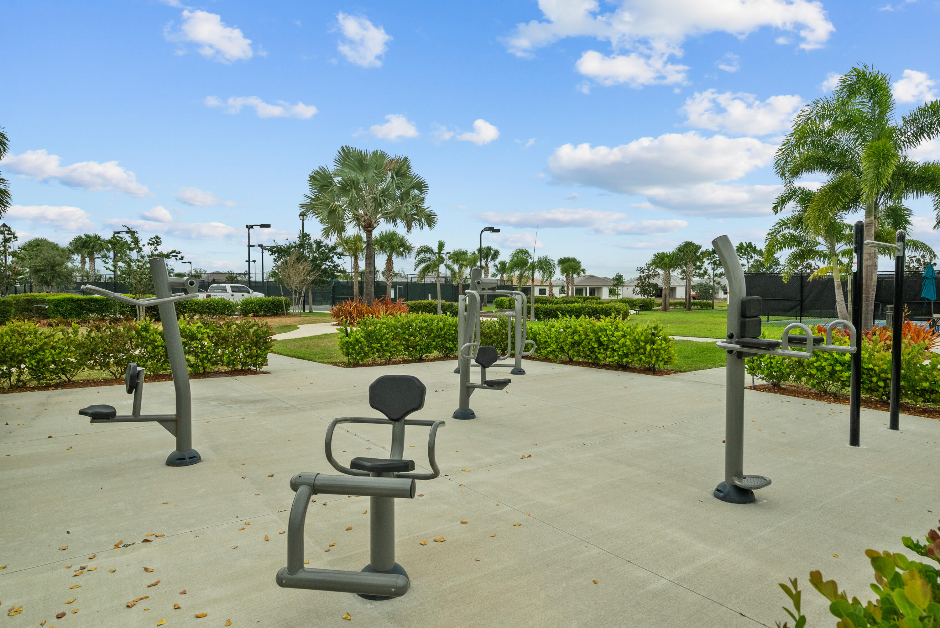 680 Southeast Villandry Way Port St. Lucie, FL 34984 - Photo 34 of 38 a view of a bench in a park