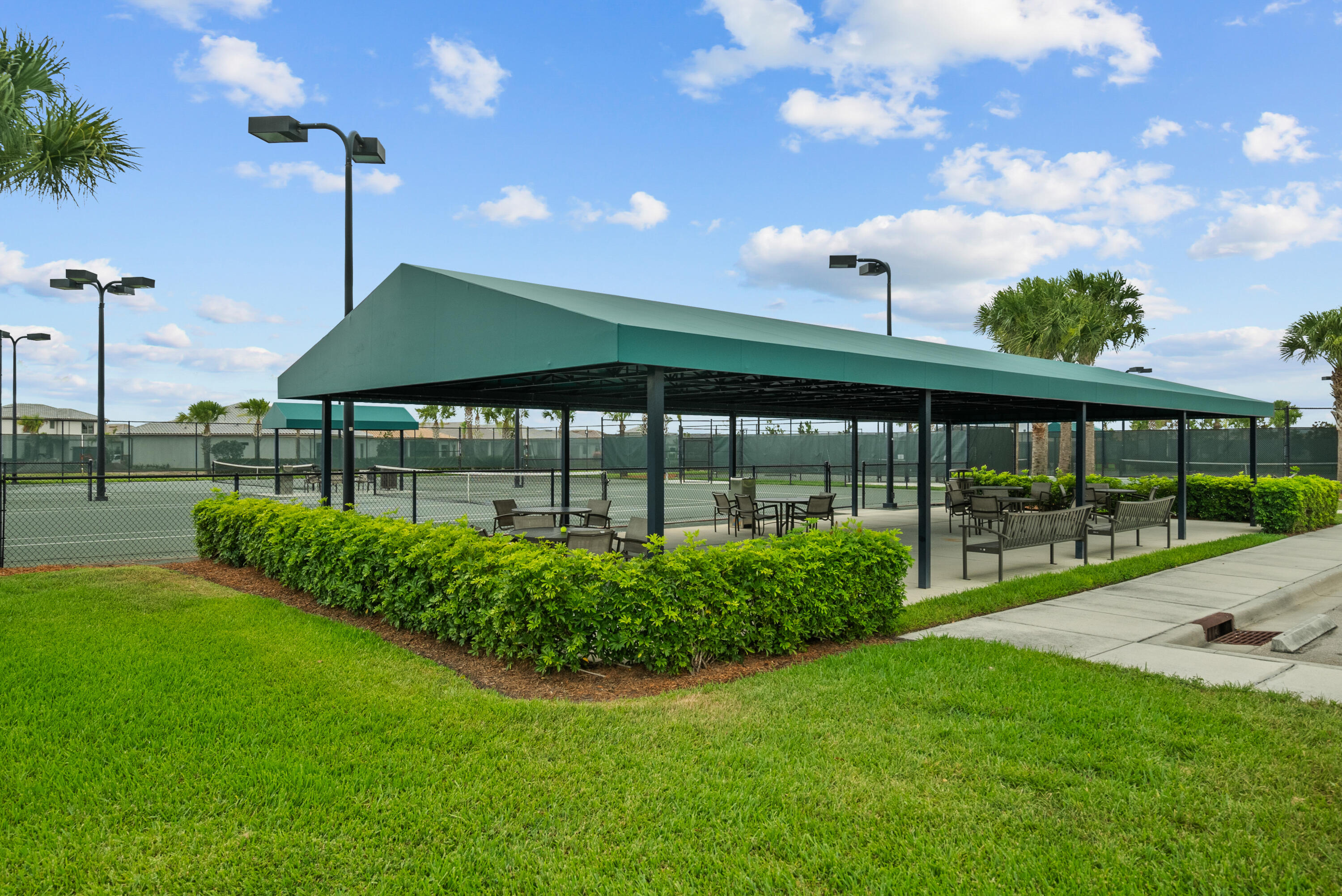 680 Southeast Villandry Way Port St. Lucie, FL 34984 - Photo 38 of 38 a view of a house with backyard
