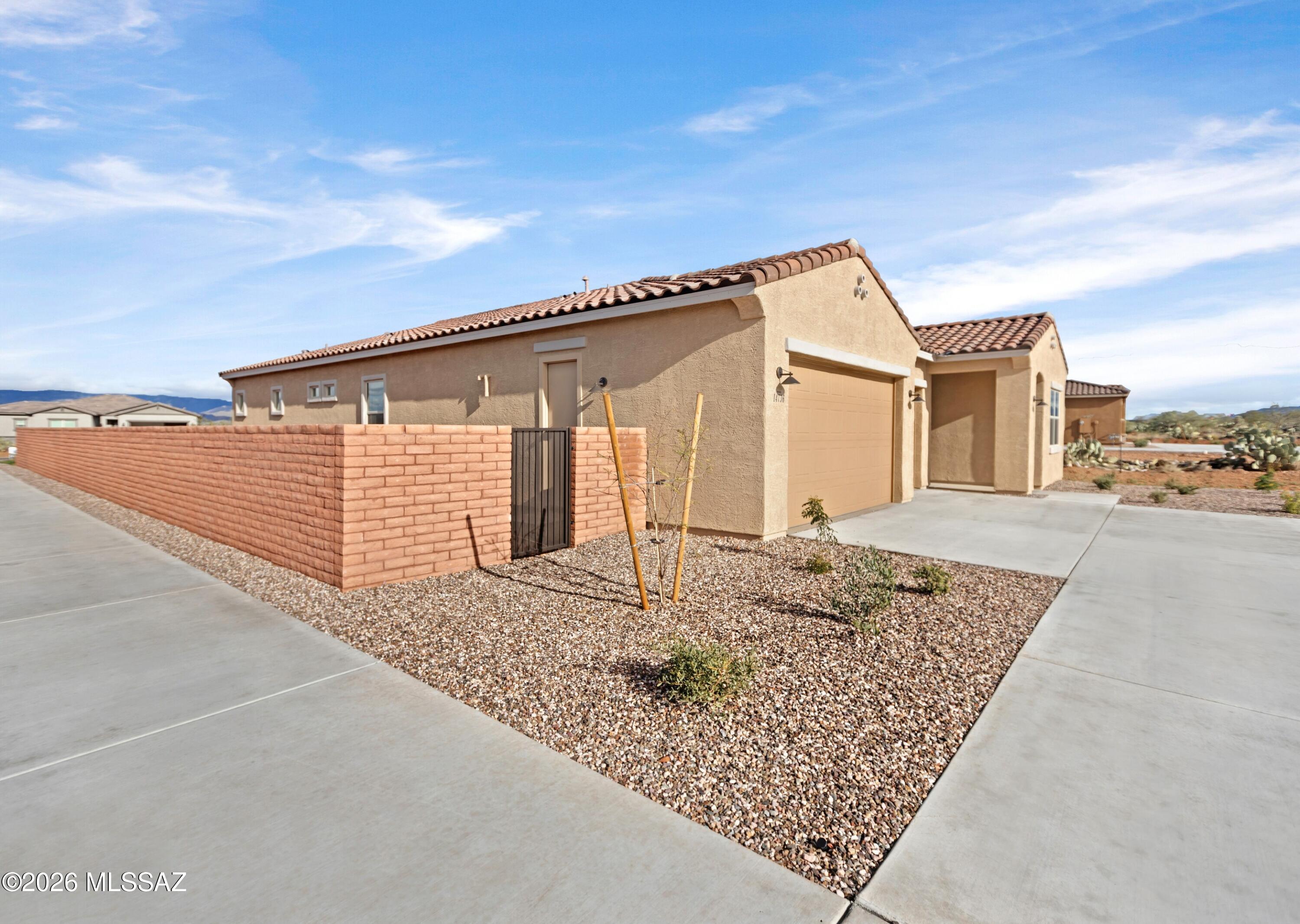 14736 East Sands Ranch Road Vail, AZ 85641 - Photo 20 of 20 a view of a house with a backyard