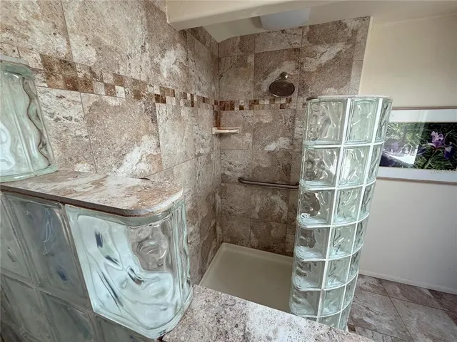 a view of entryway with bathroom