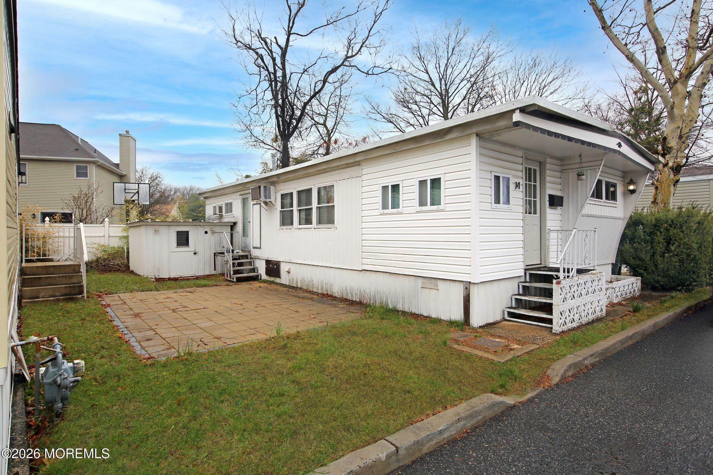 14 Monique Circle Hazlet, NJ 07730 - Photo 2 of 23 a view of a house with a yard