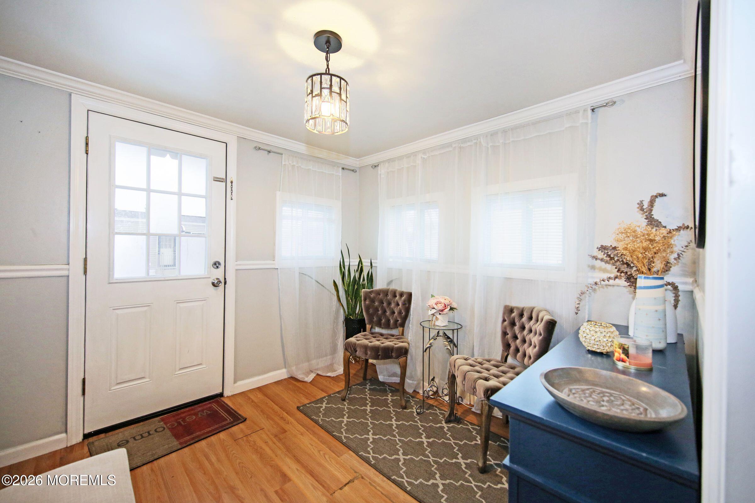 14 Monique Circle Hazlet, NJ 07730 - Photo 5 of 23 a living room with furniture and wooden floor