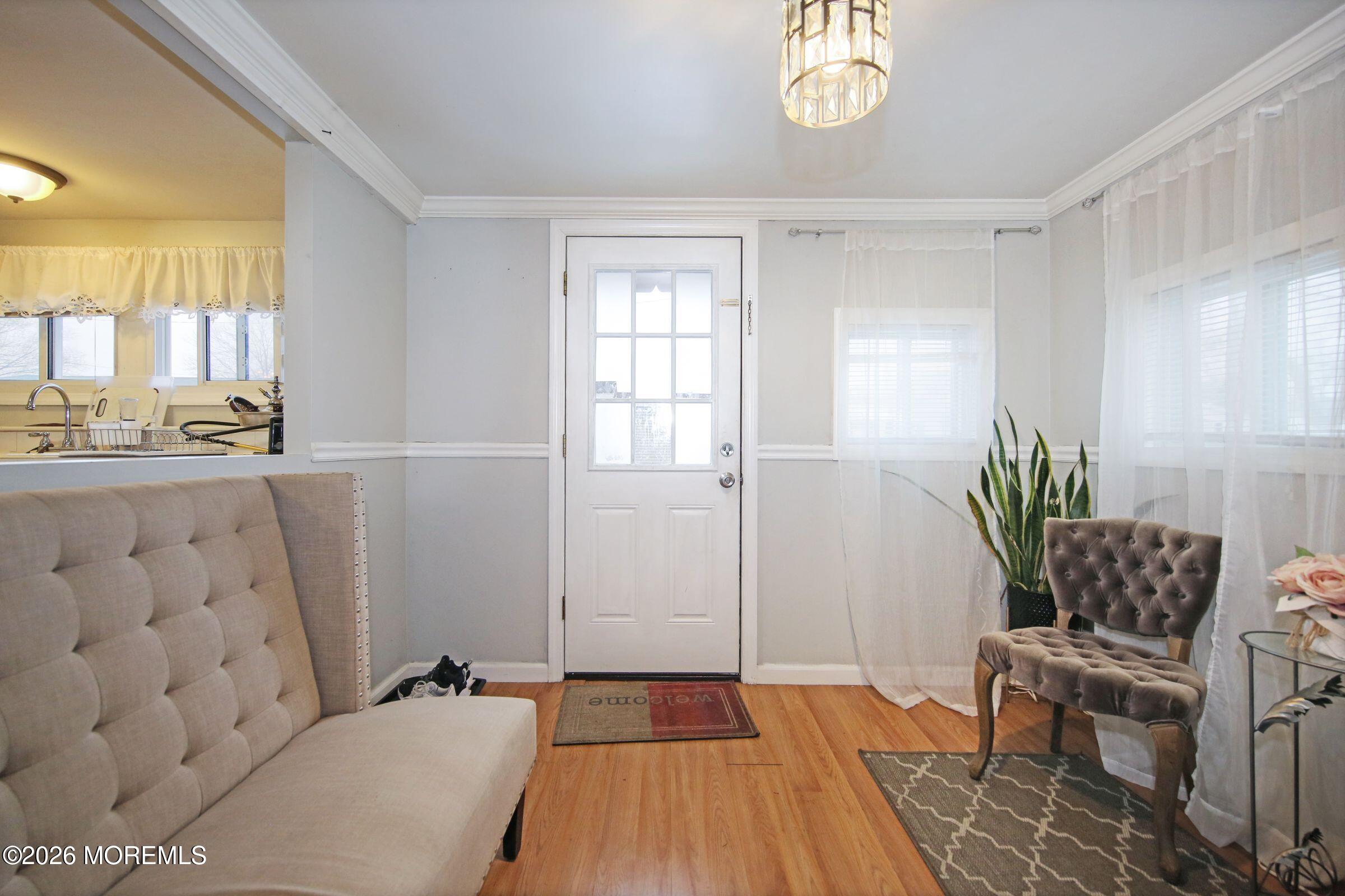 14 Monique Circle Hazlet, NJ 07730 - Photo 6 of 23 a living room with furniture and a table