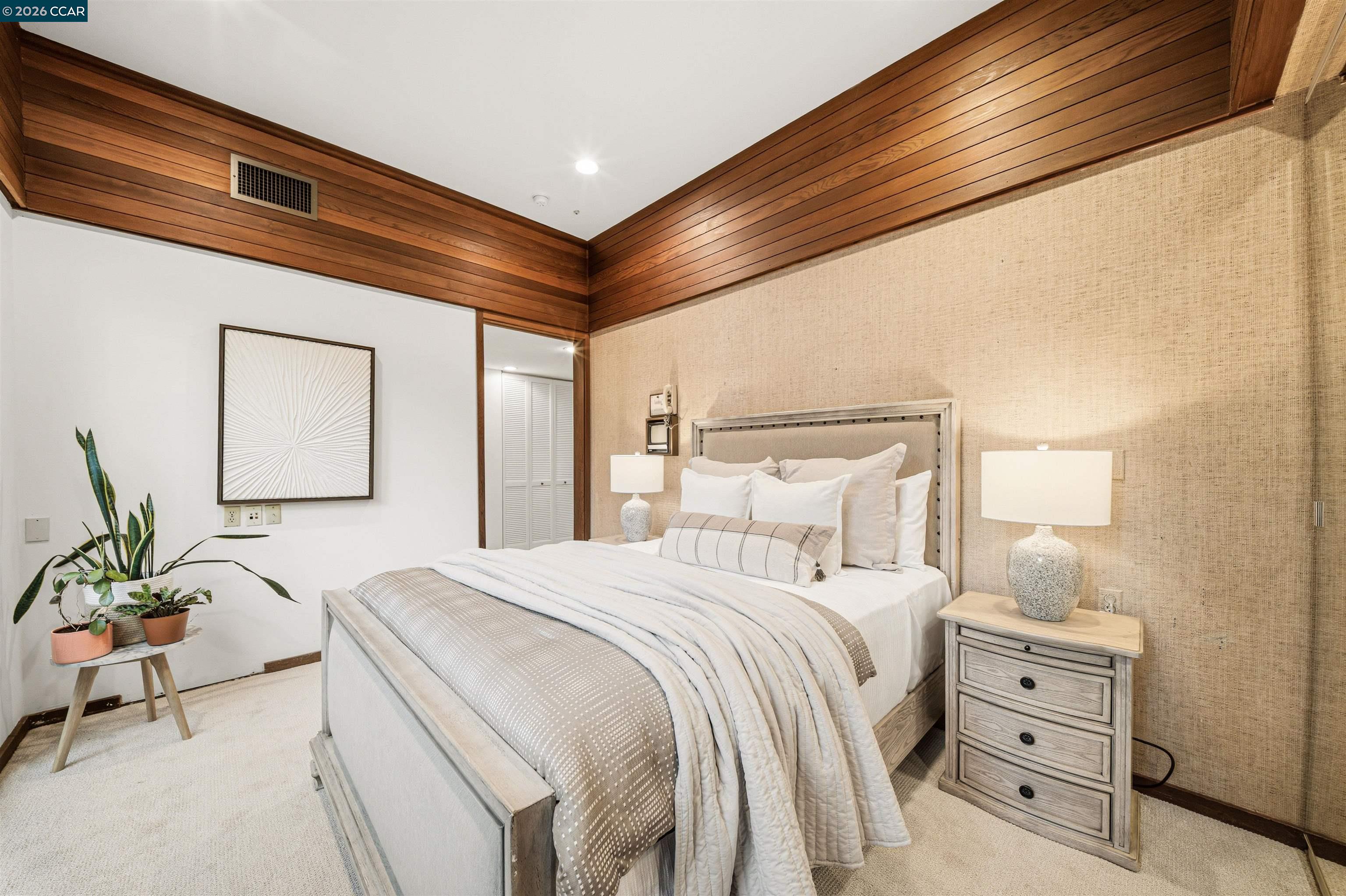 841 Kirkcrest Road Alamo, CA 94507 - Photo 38 of 62 a bedroom with a bed and a potted plant