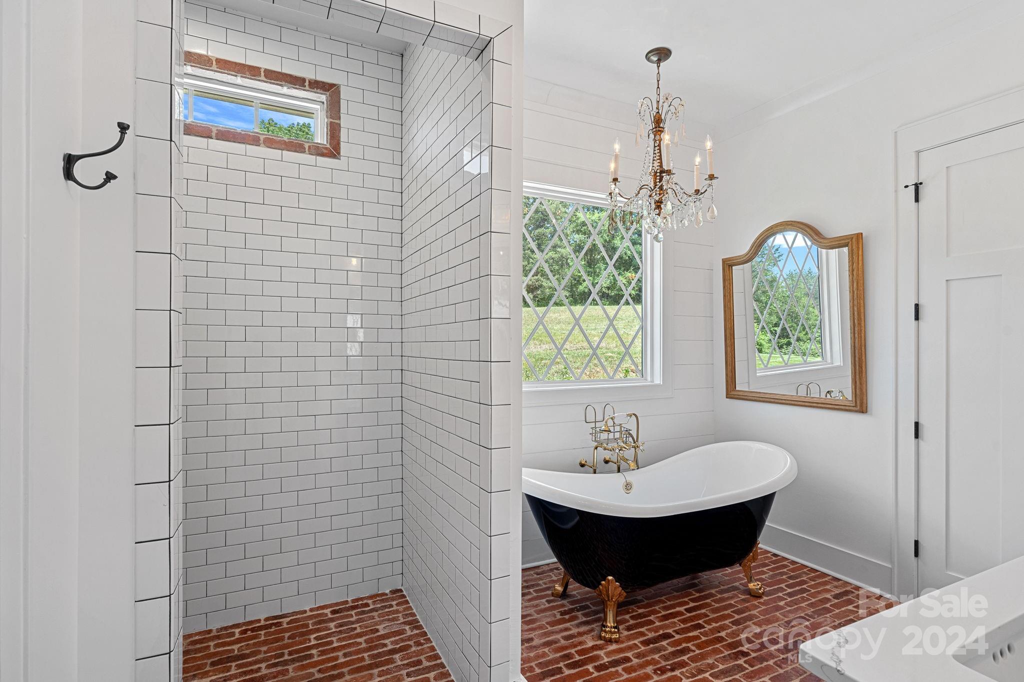 1198 Garvin Road York, SC 29745 - Photo 12 of 45 a bathroom with a sink a toilet and shower