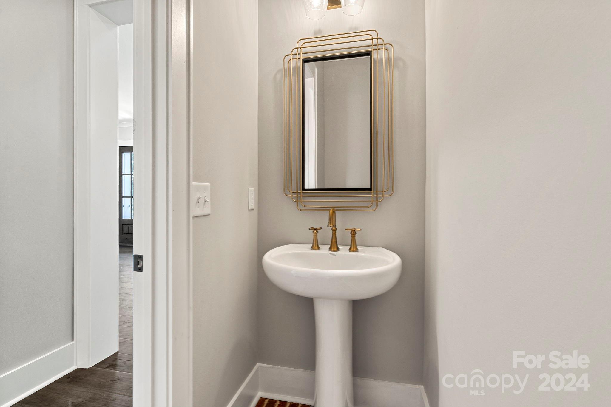 1198 Garvin Road York, SC 29745 - Photo 15 of 45 a bathroom with a sink and a mirror