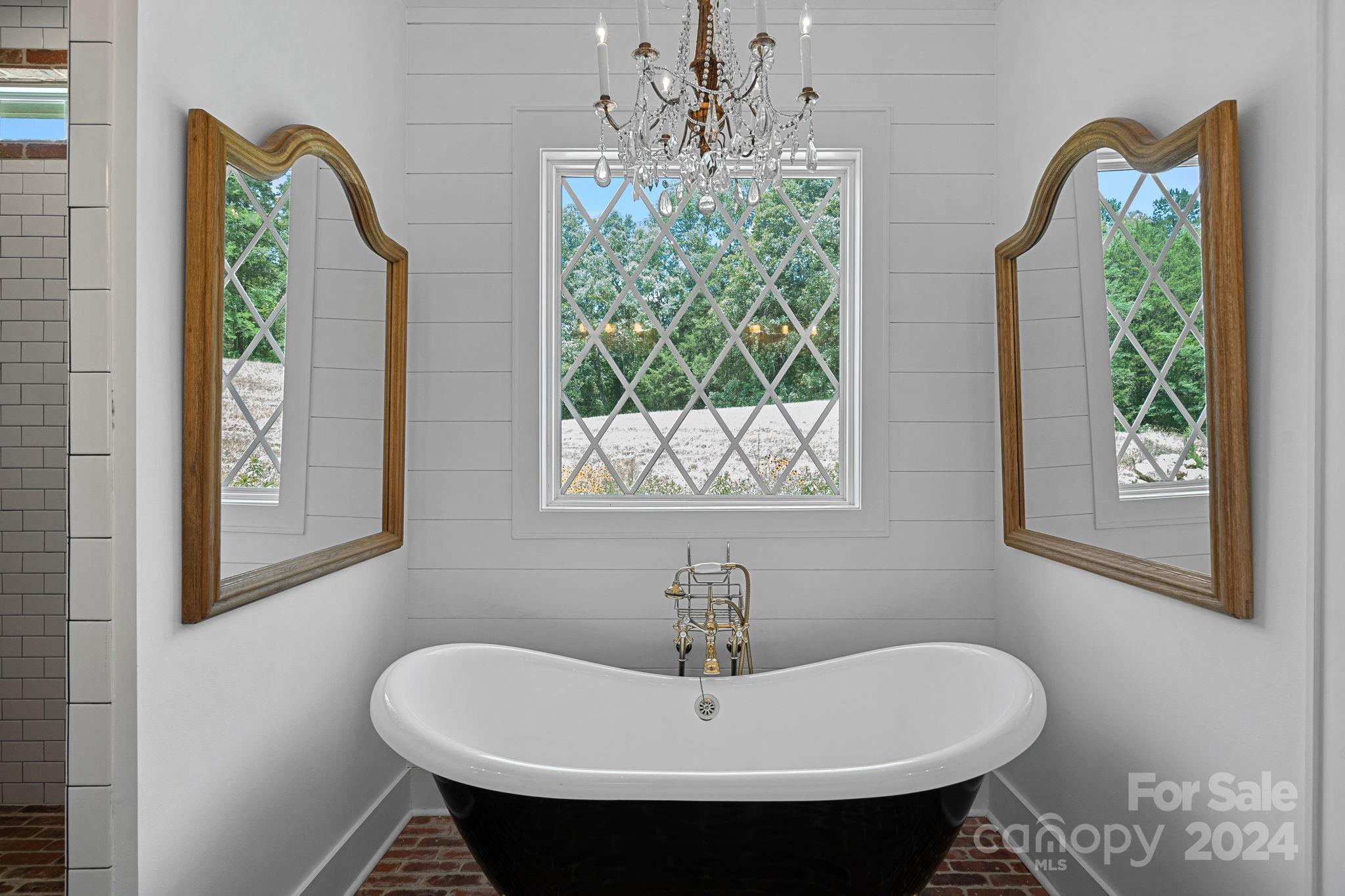 1198 Garvin Road York, SC 29745 - Photo 17 of 45 a bathroom with a sink and a window