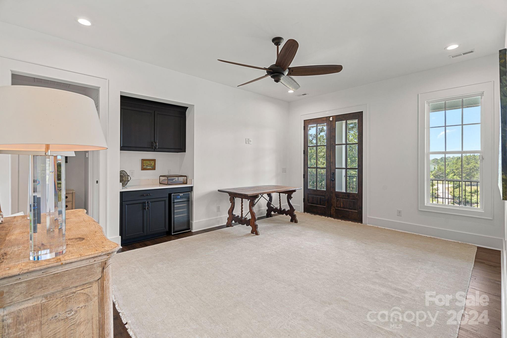 1198 Garvin Road York, SC 29745 - Photo 19 of 45 a living room with furniture a ceiling fan and a flat screen tv