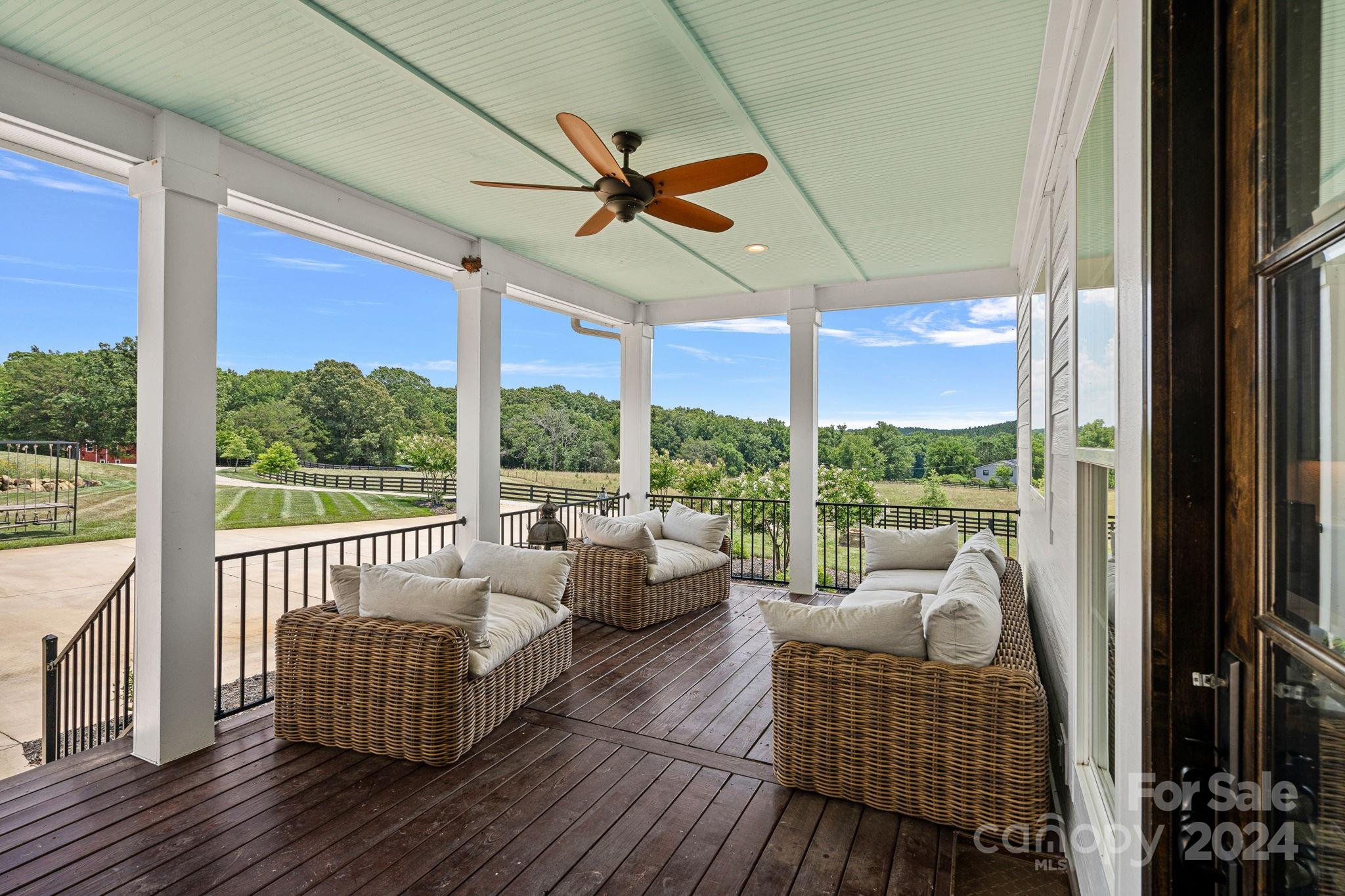 1198 Garvin Road York, SC 29745 - Photo 26 of 45 a living room with furniture and a floor to ceiling window