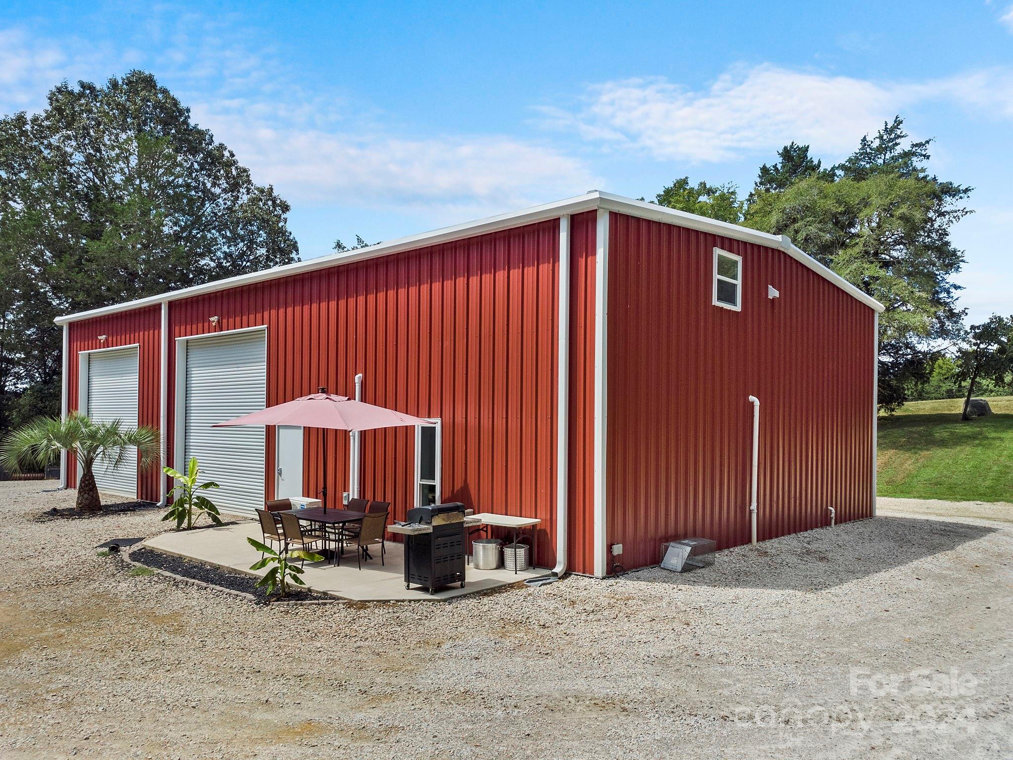 1198 Garvin Road York, SC 29745 - Photo 29 of 45 a view of a house with backyard and sitting area