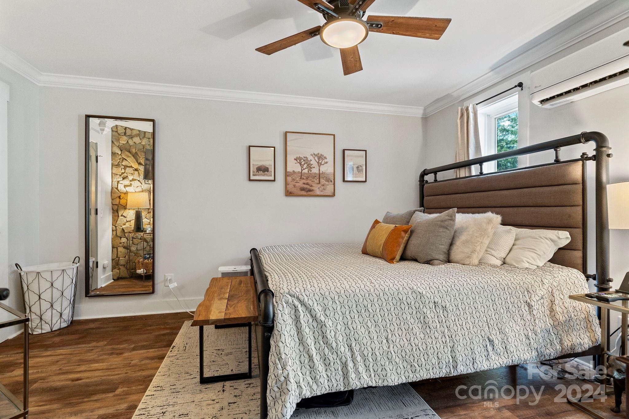 1198 Garvin Road York, SC 29745 - Photo 35 of 45 a bedroom with a bed and wooden floor