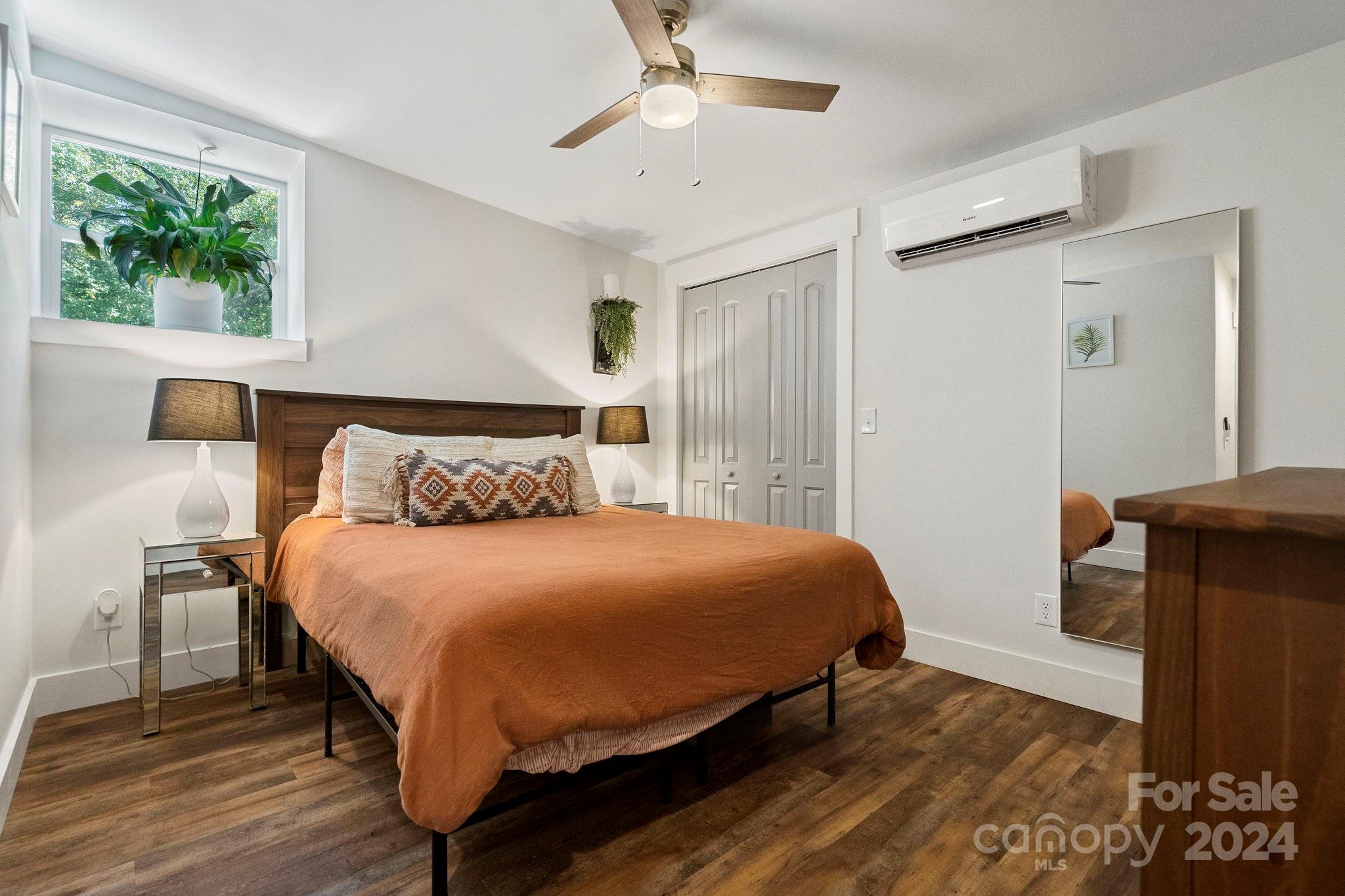 1198 Garvin Road York, SC 29745 - Photo 38 of 45 a bedroom with a bed and a chandelier