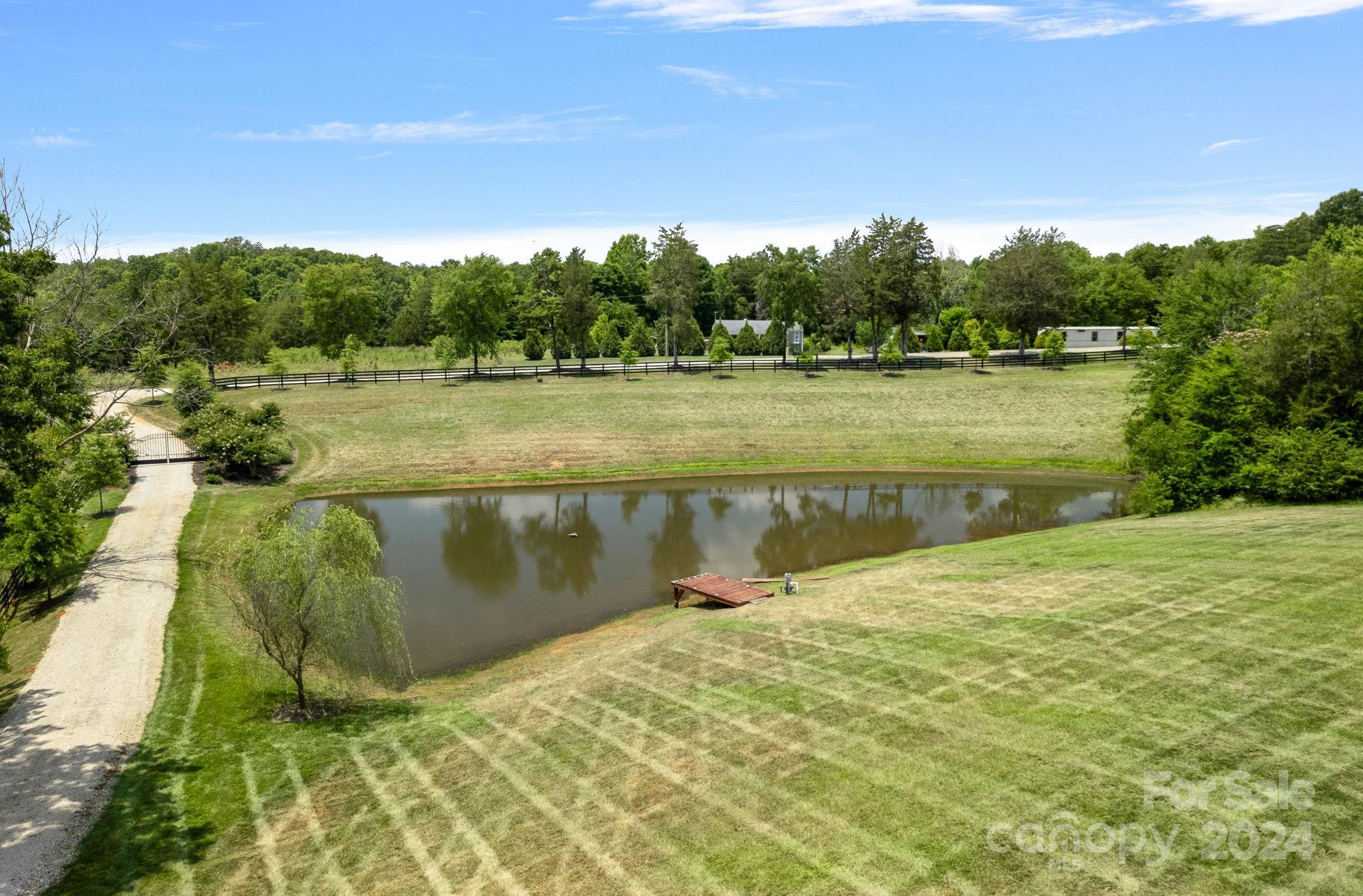 1198 Garvin Road York, SC 29745 - Photo 41 of 45 a view of a lake with a yard