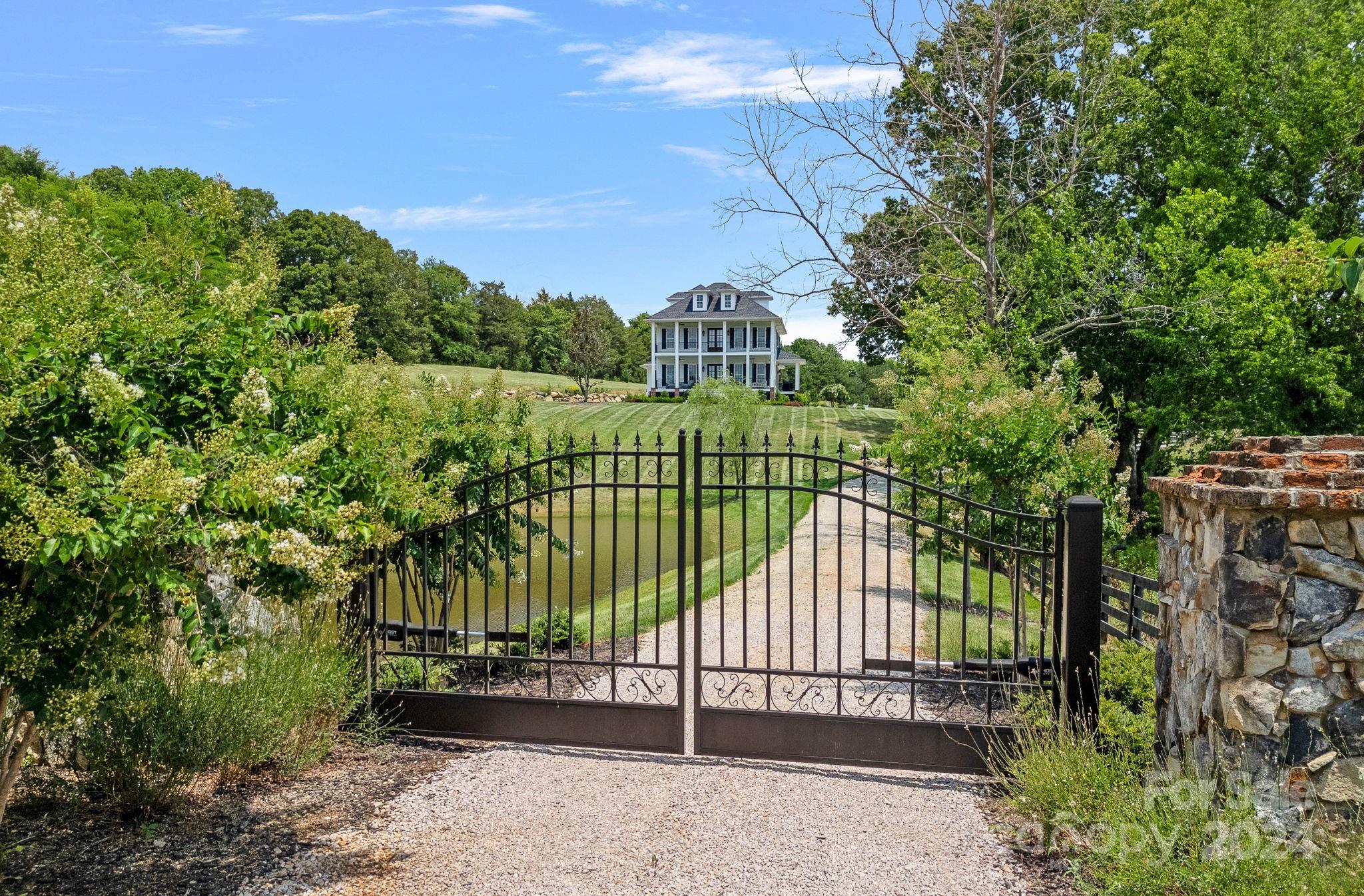 1198 Garvin Road York, SC 29745 - Photo 43 of 45 a view of a fence and a trees in the background
