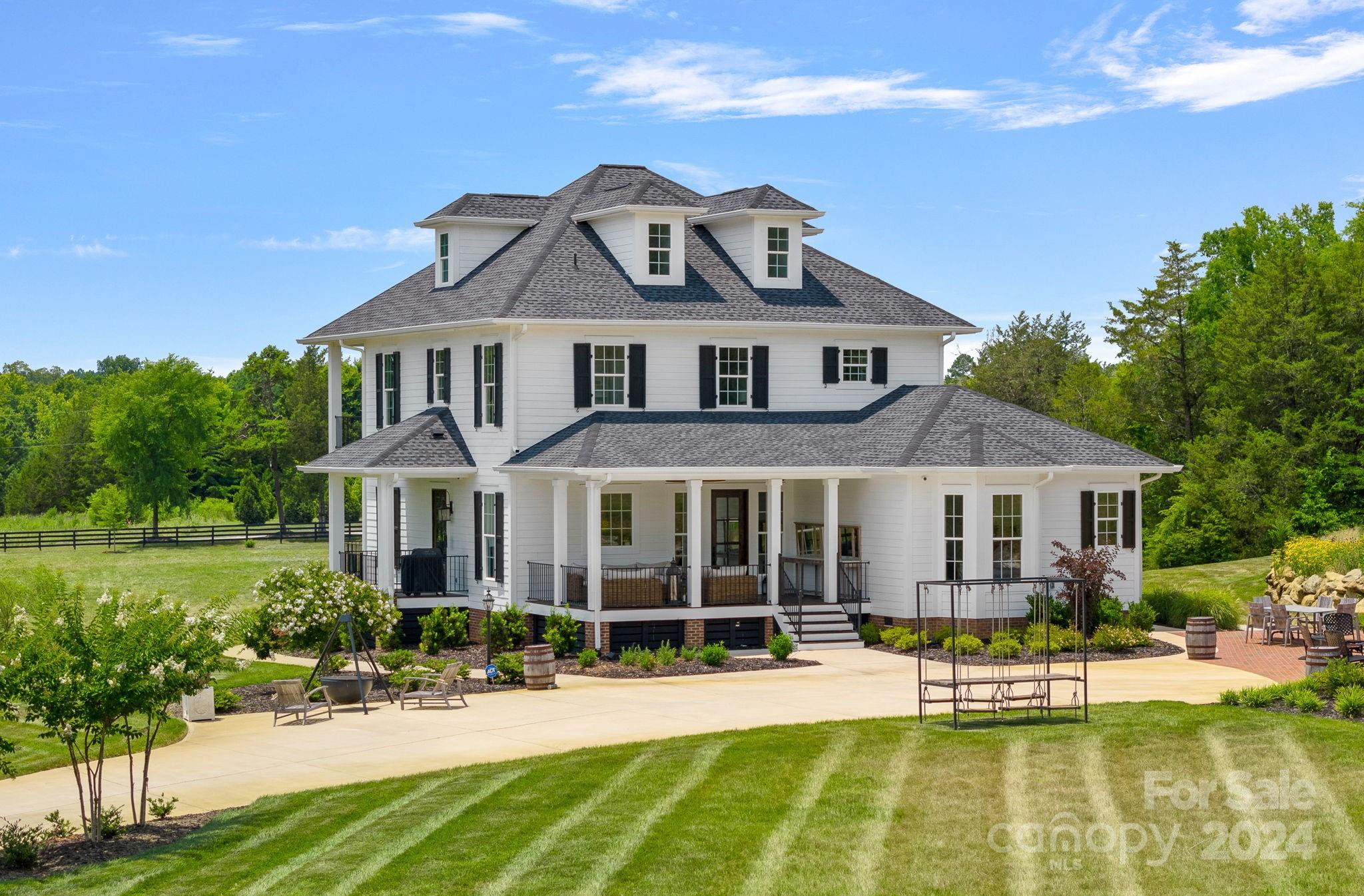 1198 Garvin Road York, SC 29745 - Photo 45 of 45 a front view of a house with a yard table and chairs
