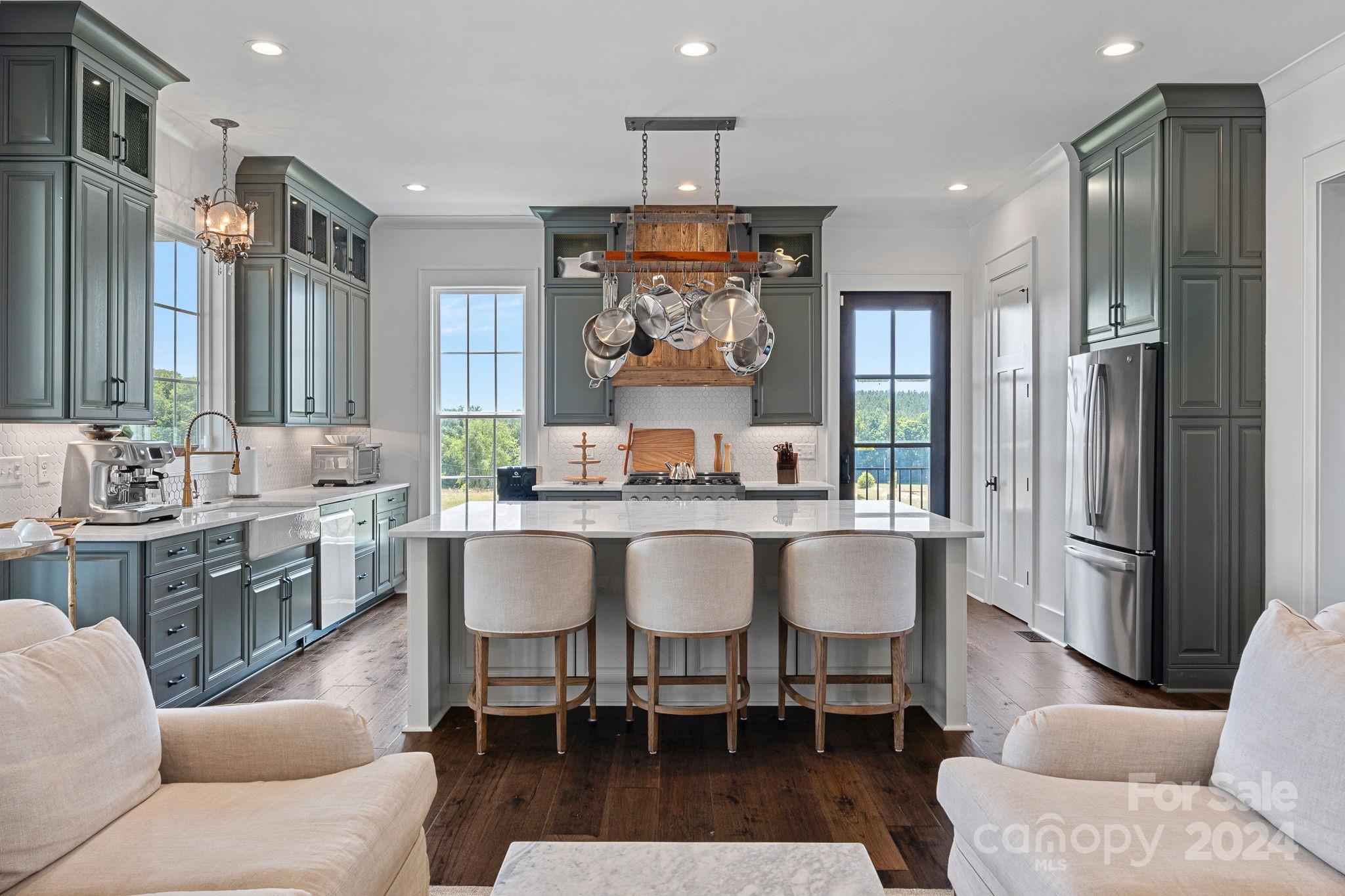 1198 Garvin Road York, SC 29745 - Photo 8 of 45 a living room with granite countertop furniture a dining table and kitchen view