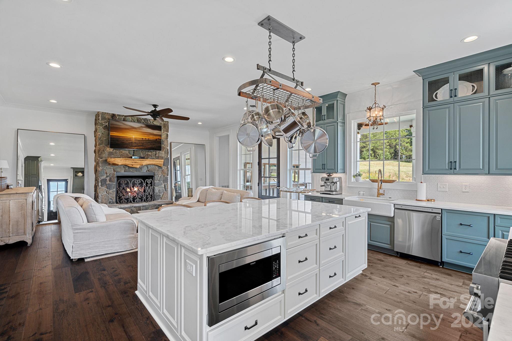 1198 Garvin Road York, SC 29745 - Photo 10 of 45 a kitchen with sink cabinets and wooden floor
