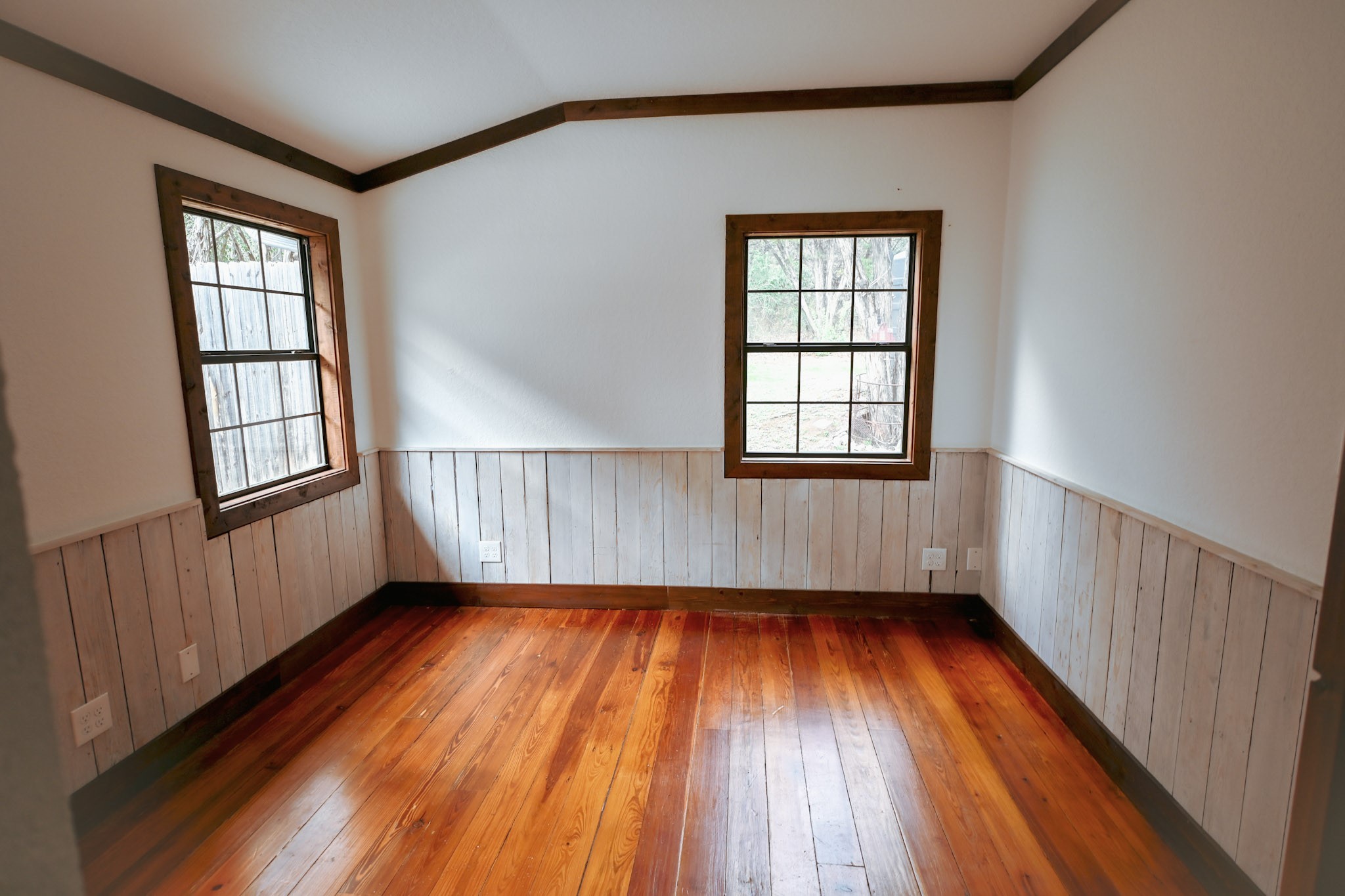 15104 Texas Street Austin, TX 78734 - Photo 11 of 18 wooden floor in an empty room with a window