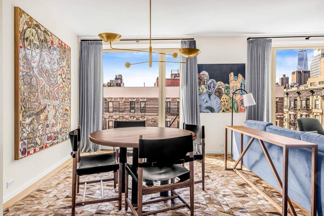 75 Kenmare Street, Unit 6B Manhattan, NY 10012 - Photo 7 of 11 a dining room with furniture and window