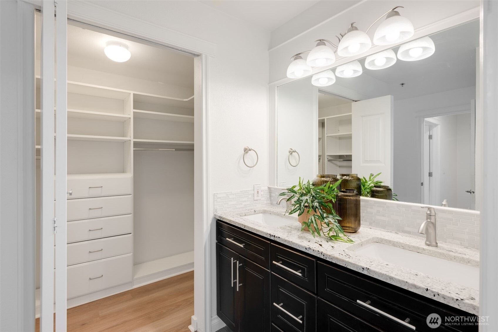 701 Galer Street, Unit 819 Seattle, WA 98109 - Photo 11 of 21 a bathroom with a sink and a mirror